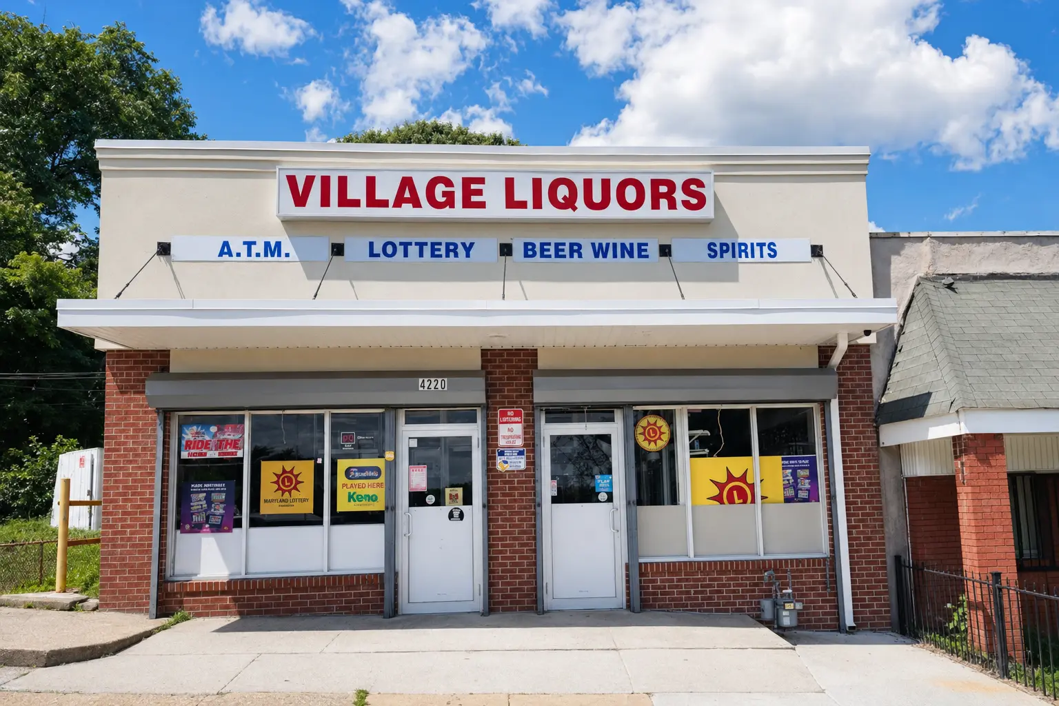 Village Liquors storefront at 4220 Edmondson Avenue in Baltimore